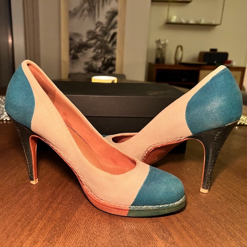 The Office of Angela Scott's Cream and Green Pumps